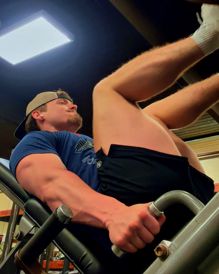 Jacob pressing dumbbells
